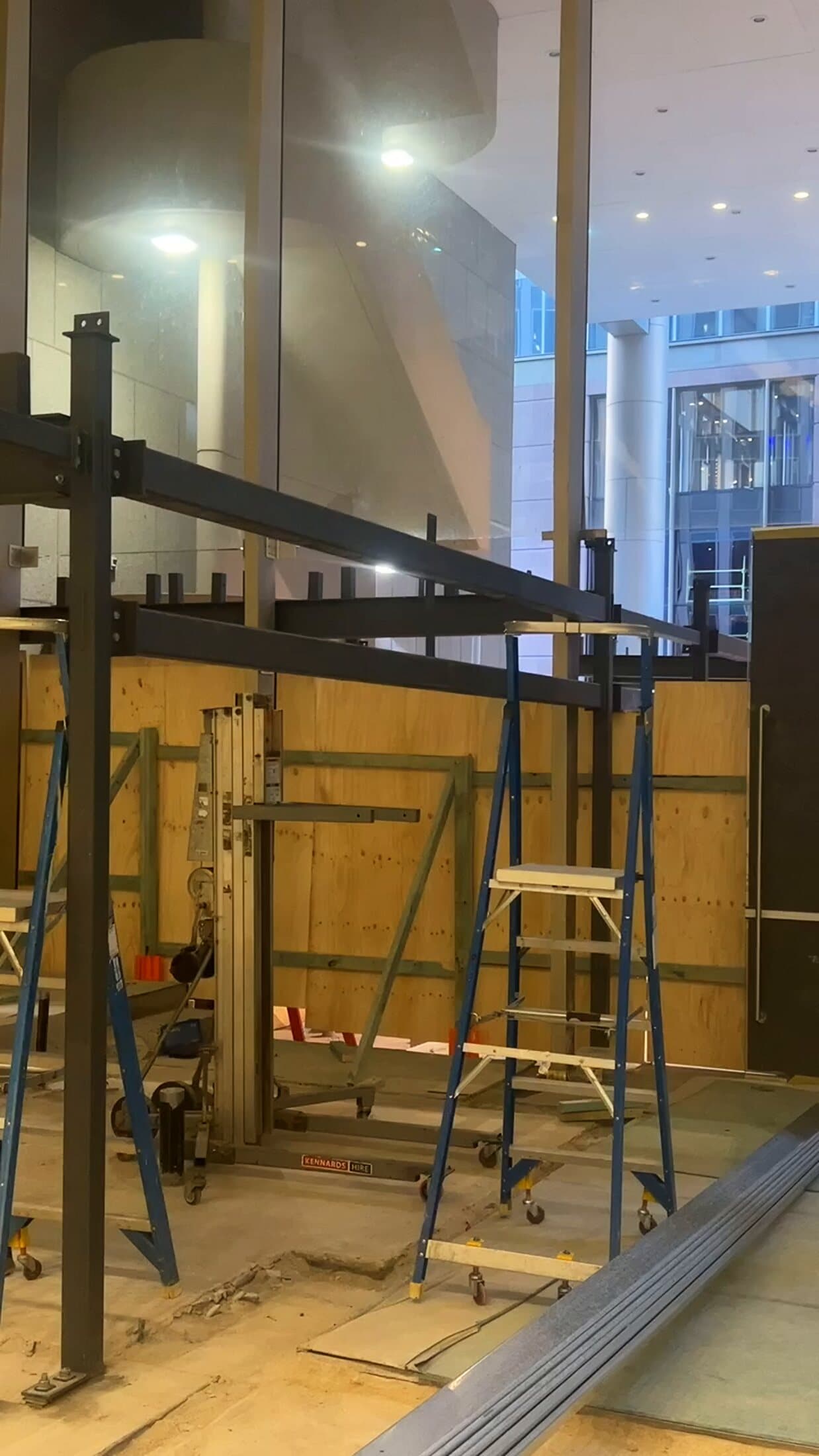 Steel frame standing in a building lobby during fitout