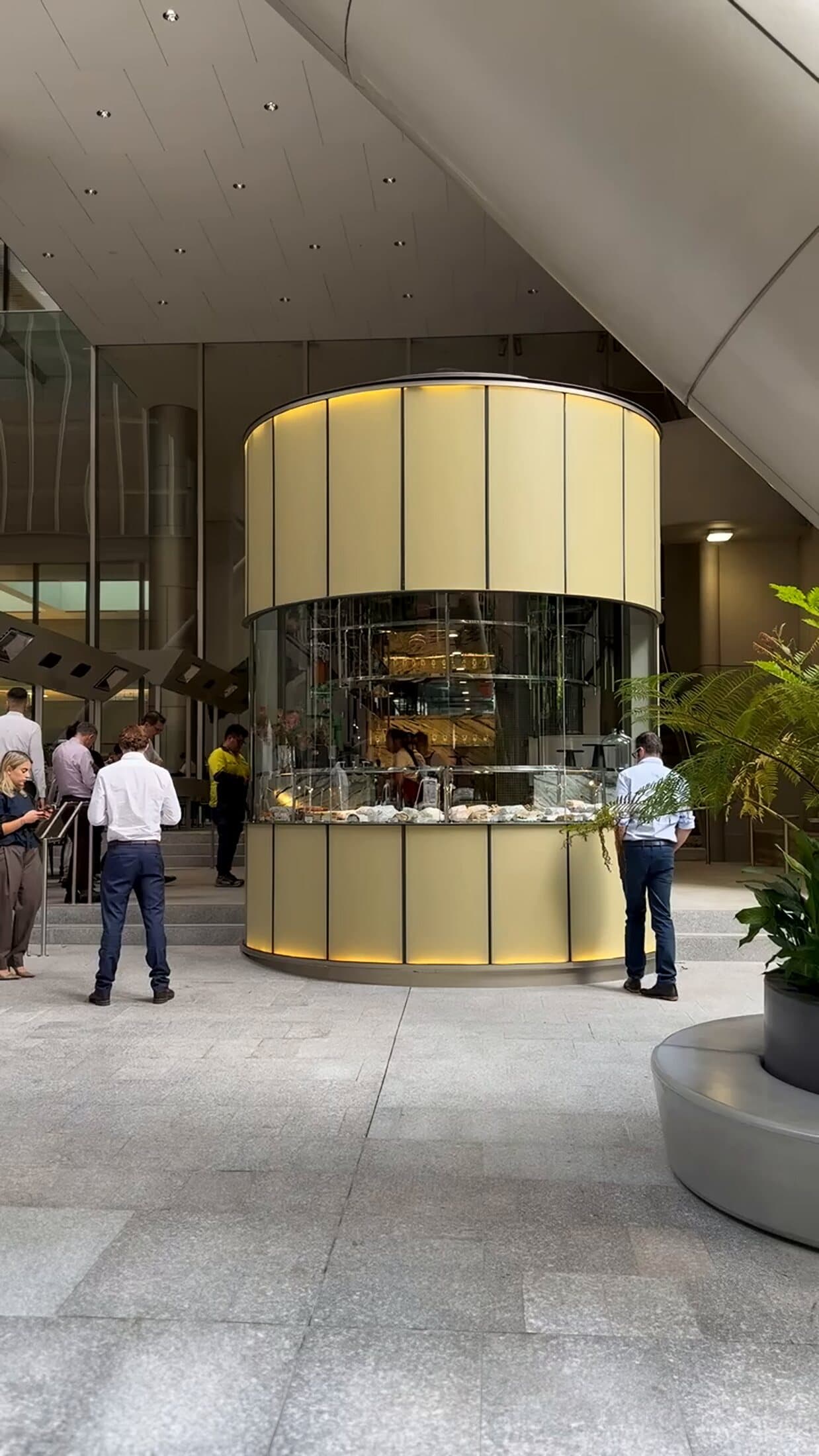 Completed curved kiosk in a commercial lobby