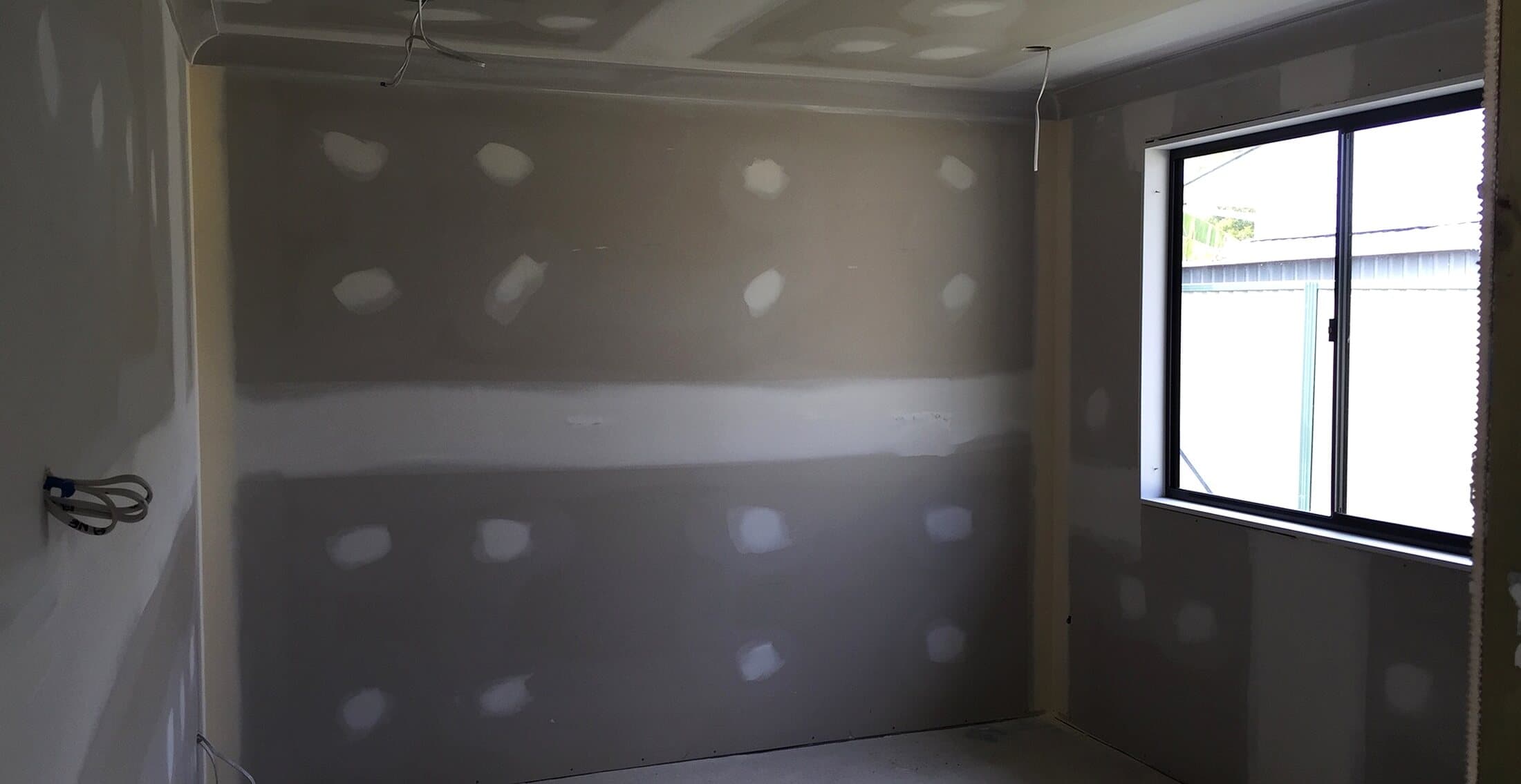 Newly plastered internal walls ready for finishing