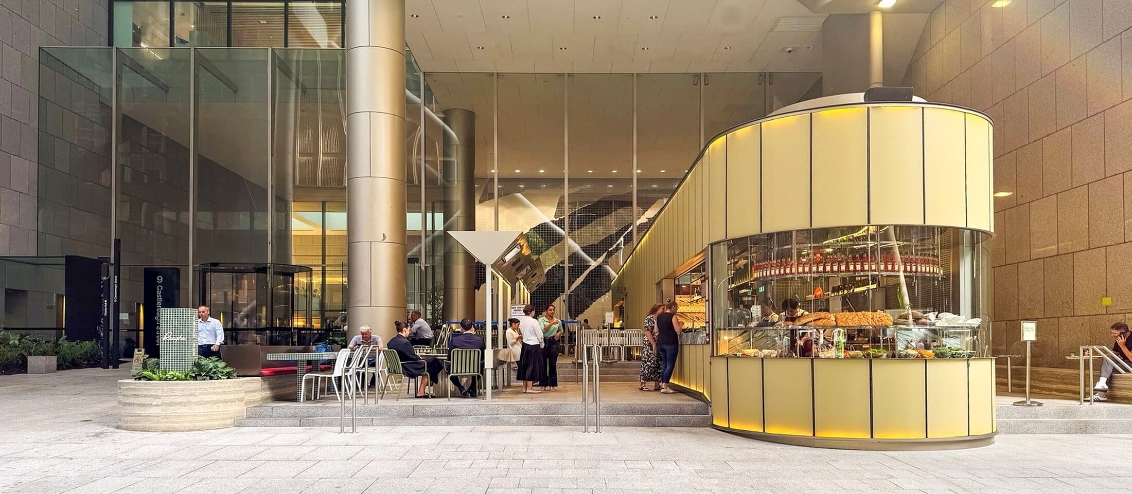 Completed commercial fitout with a curved kiosk
